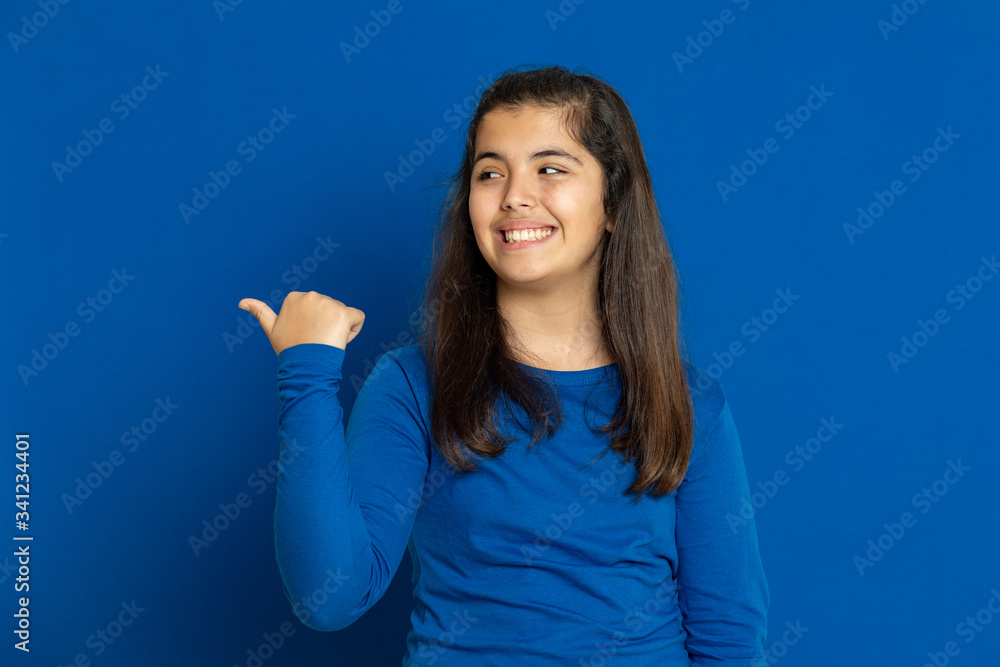 Brunette young woman wearing a yellow T-shirt Brunette young woman wearing a yellow T-shirt