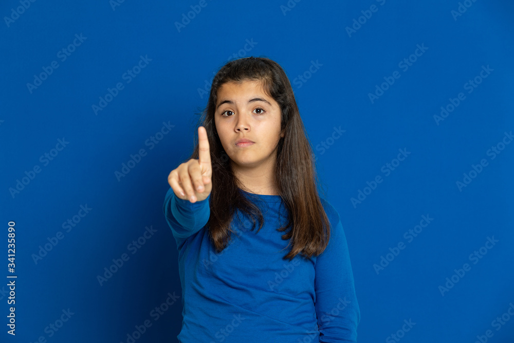 Adorable preteen girl with yellow jersey Adorable preteen girl with yellow jersey