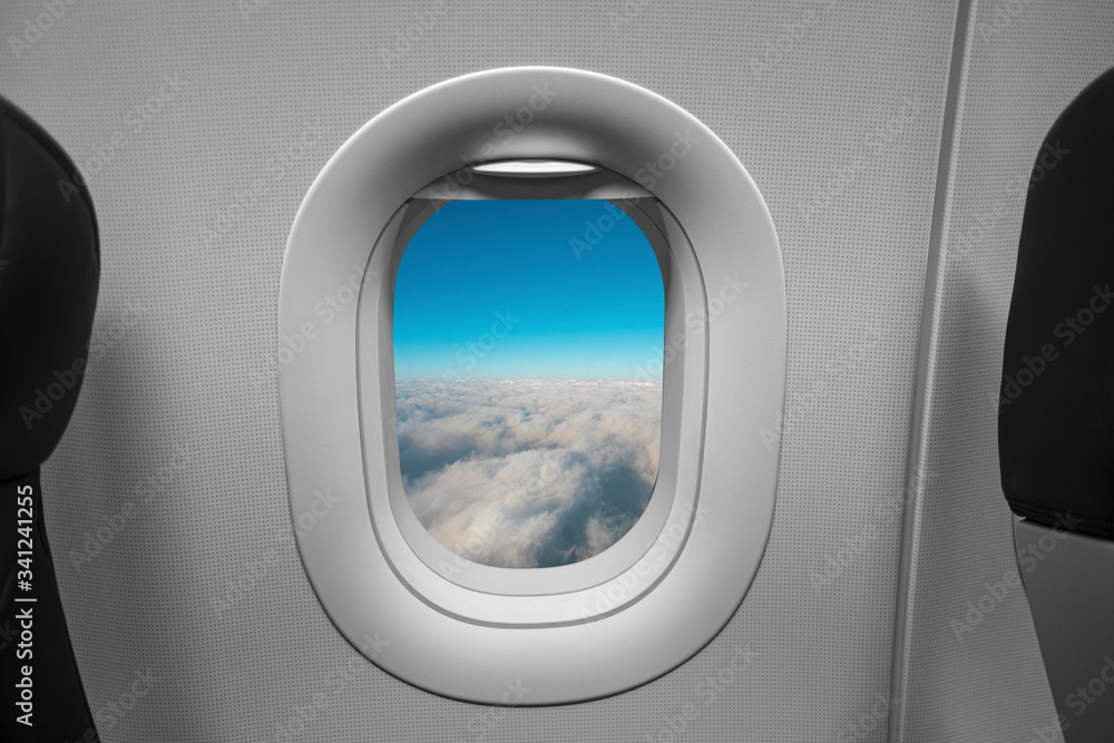 Looking out window of airplane, Looking blue sky on airplane flying. Travel and tourism concept. Looking out window of airplane, Looking blue sky on airplane flying. Travel and tourism concept.