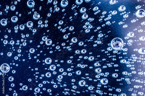 Water droplets on blue