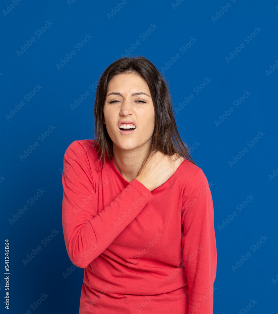 Obraz premium Brunette young woman wearing a red T-shirt