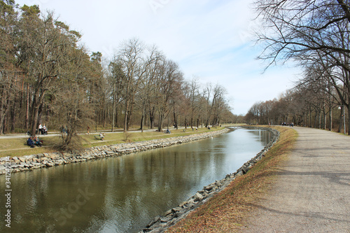 canal in spring with cloudy sky © Mattias