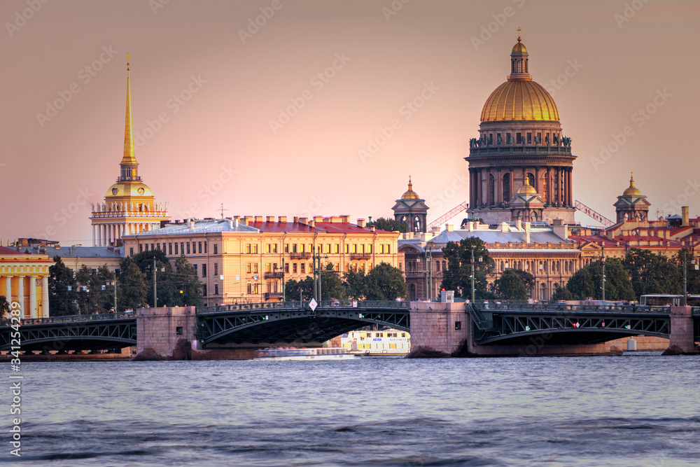 St. Petersburg, Russia - View of St. Isaac's Cathedral on a summer evening Admiralty building from the Neva. Summer sunset in Petersburg
