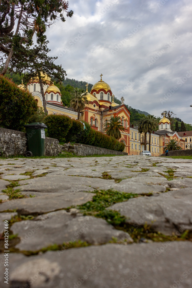 Fototapeta premium Abkhazia, New Athos. View of the monastery with golden domes