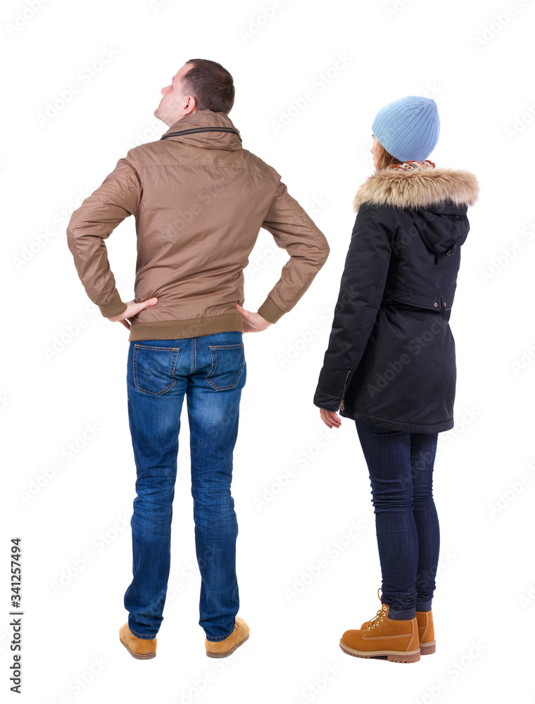 Back view of couple in winter jacket. Back view of couple in winter jacket.