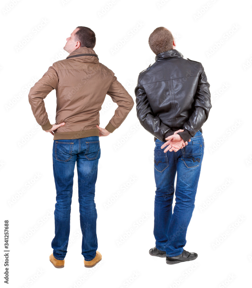 Back view of couple in winter jacket. Back view of couple in winter jacket.