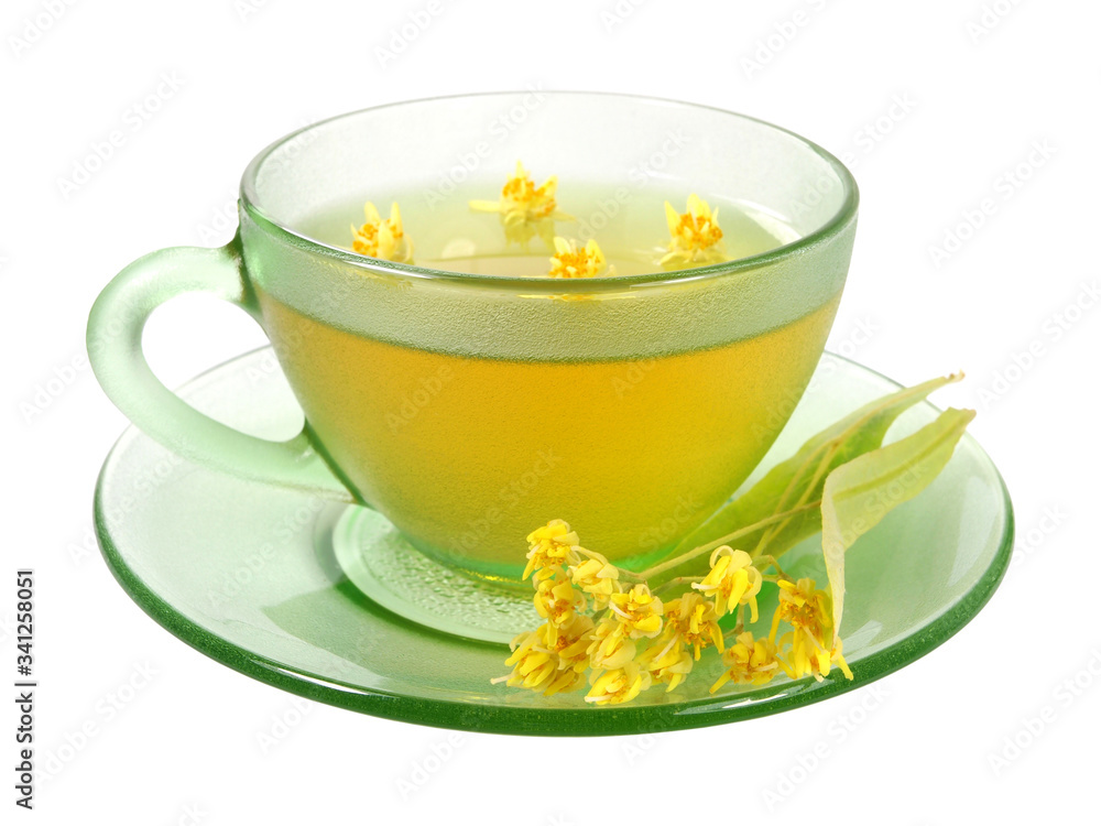 Cup of linden tea and flowers isolated on white Cup of linden tea and flowers isolated on white
