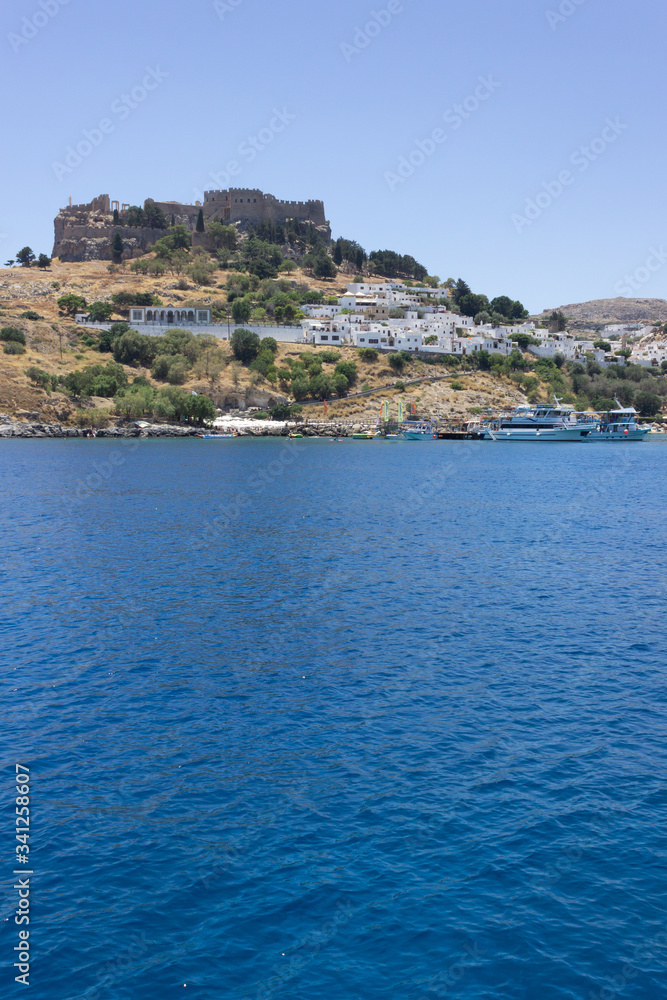 Lindos Village on Rhodes, Greece. Panorama made of the sea.