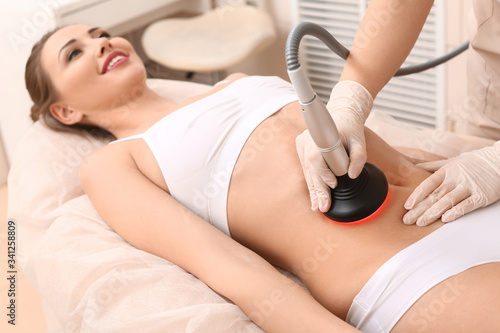 Beautiful woman undergoing ...