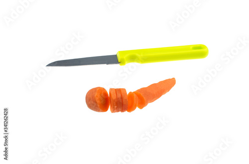 chopping a carrot on white background
