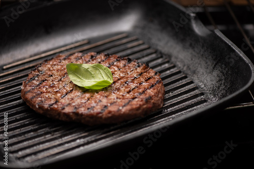 A beef burger grill cooking