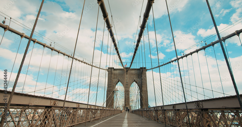 Fototapeta premium DX EST Super wide angle view, establishing shot of a Brooklyin bridge in New York, USA. No people walking on usually crowded bridge during coronavirus pandemic