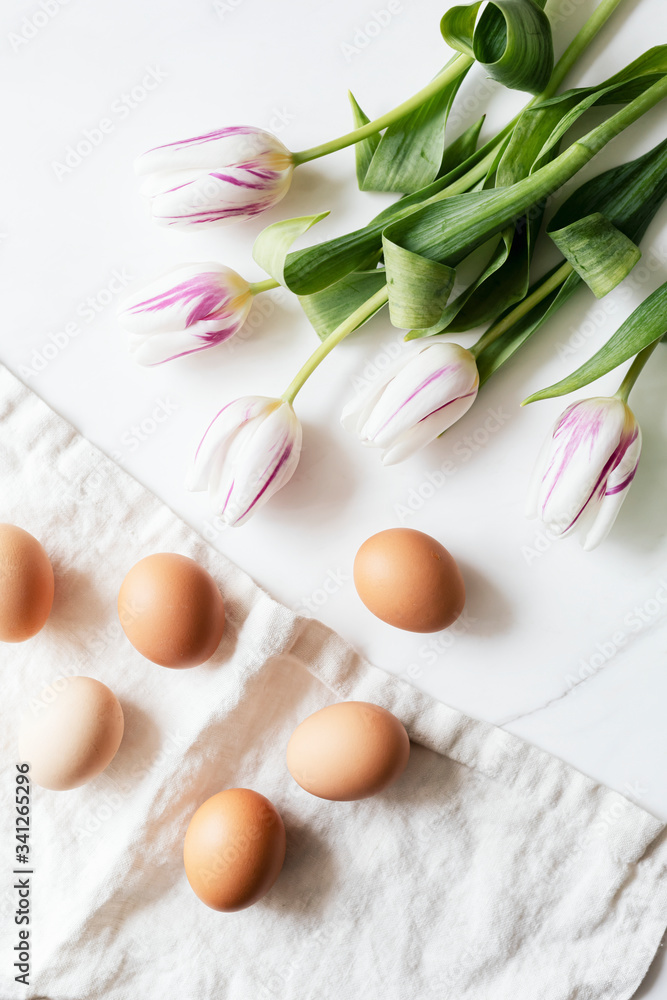 Easter eggs and tulips flatlay Easter eggs and tulips flatlay