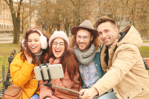 Happy friends taking selfie...