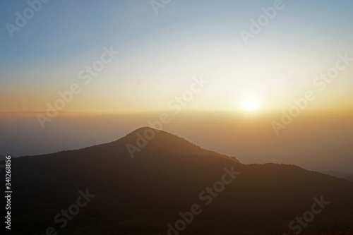 Landscape of Sunset sky with view of natural mountain range © chettarin