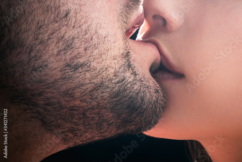 Sensual kissing. Couple In Love. Intimate relationship and sexual relations. Closeup mouths kissing. Passion and sensual touch. Romantic and love. photo