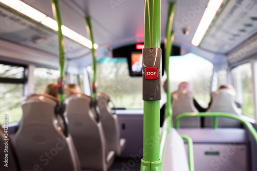 Stop button on the green handrail. Passenger's perspective view.