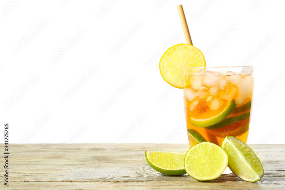 Glass of tasty cold ice tea on table against white background Glass of tasty cold ice tea on table against white background