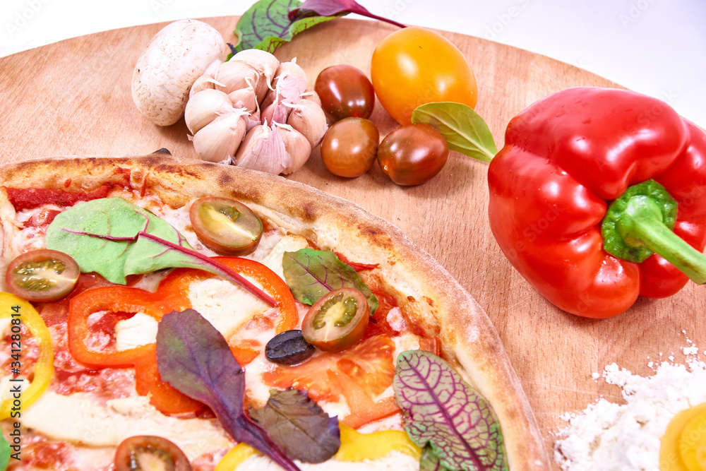 Pizza on wood with vegetables. Prepared, delivery Pizza on wood with vegetables. Prepared, delivery
