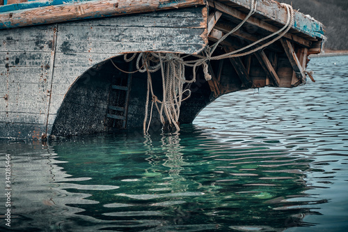 An old shipwreck Abandoned North Korean fishing boat on the sea coast