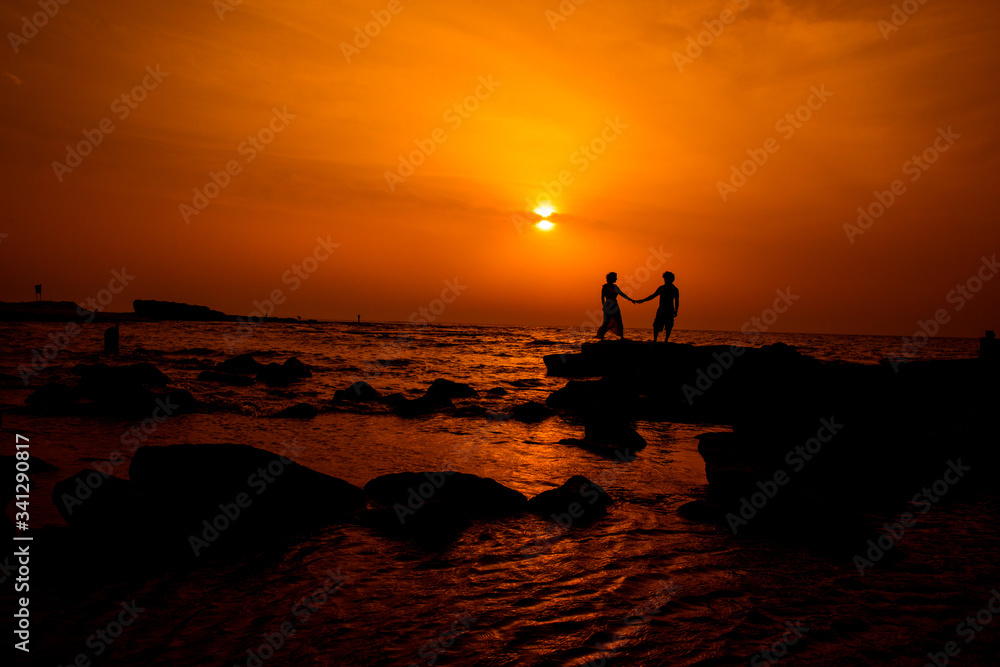 sunset, silhouette, woman, sky, people, happy, sun, jump, nature, fun, young, freedom, happiness, child, family, outdoor, running, sunrise, joy, boy, beach, jumping, summer, hands, person
