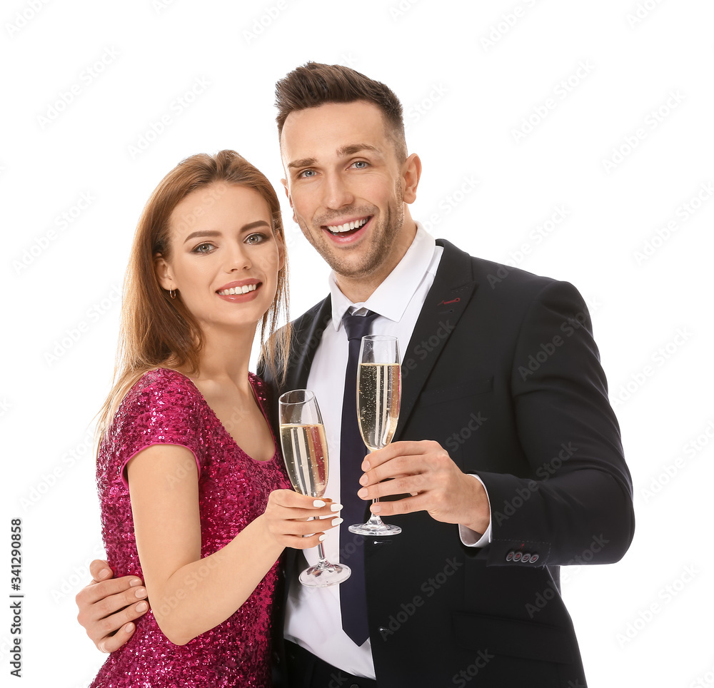 Happy couple with glasses of champagne on white background Happy couple with glasses of champagne on white background