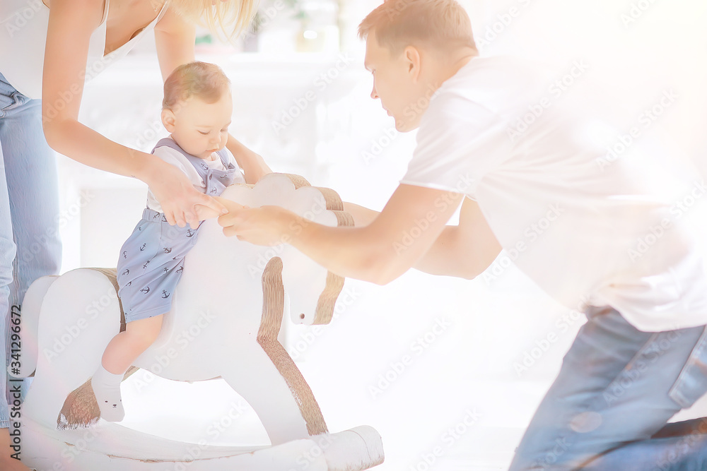 child rocking horse / little boy riding a toy horse, rocking chair children's toy vintage child rocking horse / little boy riding a toy horse, rocking chair children's toy vintage