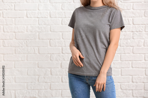 Woman in stylish t-shirt on...