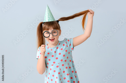 Little girl celebrating Bir...