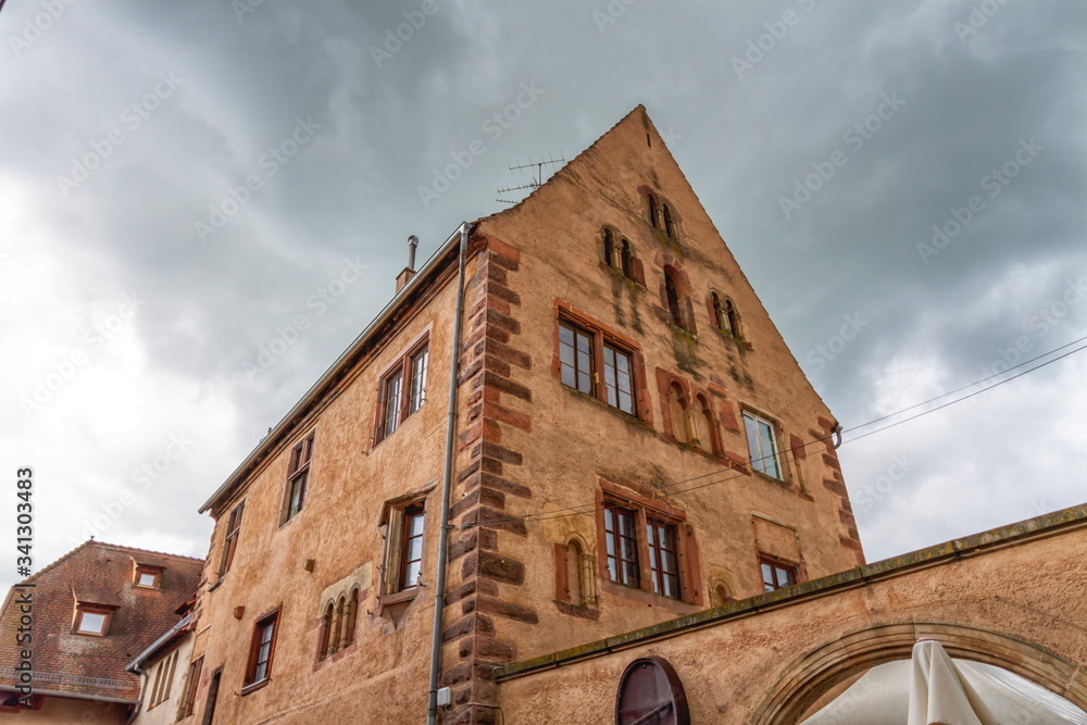 Romanesque house of the Rathsamhausens at street of Pelerins 8 by day, Obernai, Alsace, France