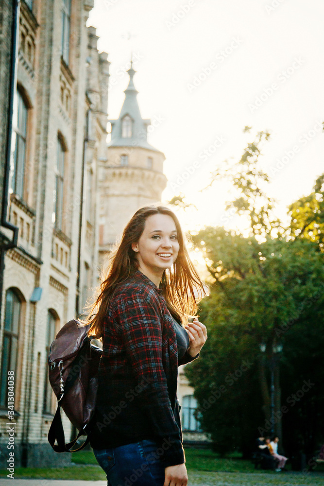 student girl near the university building