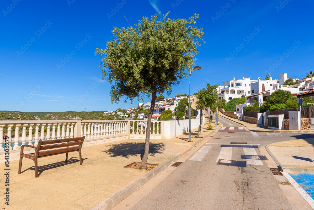 Cala En Porter promenade, one of the best resorts on Menorca, Spain