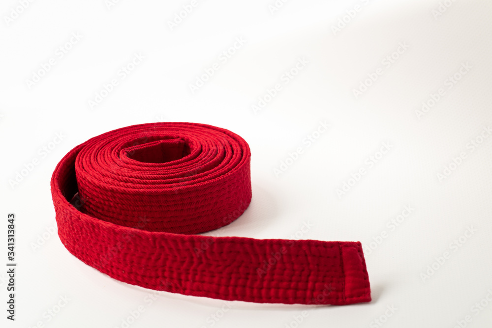 Zen art. red belt martial arts on white background. Clothes for martial arts, aikido, karate, judo. Copy paste. Zen art. red belt martial arts on white background. Clothes for martial arts, aikido, karate, judo. Copy paste.