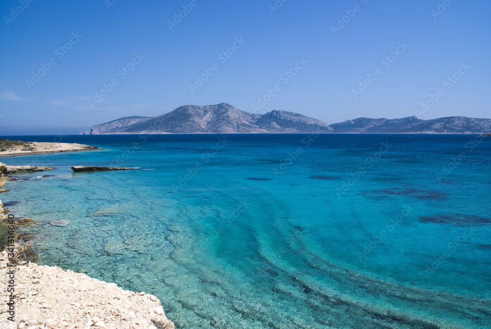 The beautiful Greek island of Koufonissi. Crystal clear calm waters ...