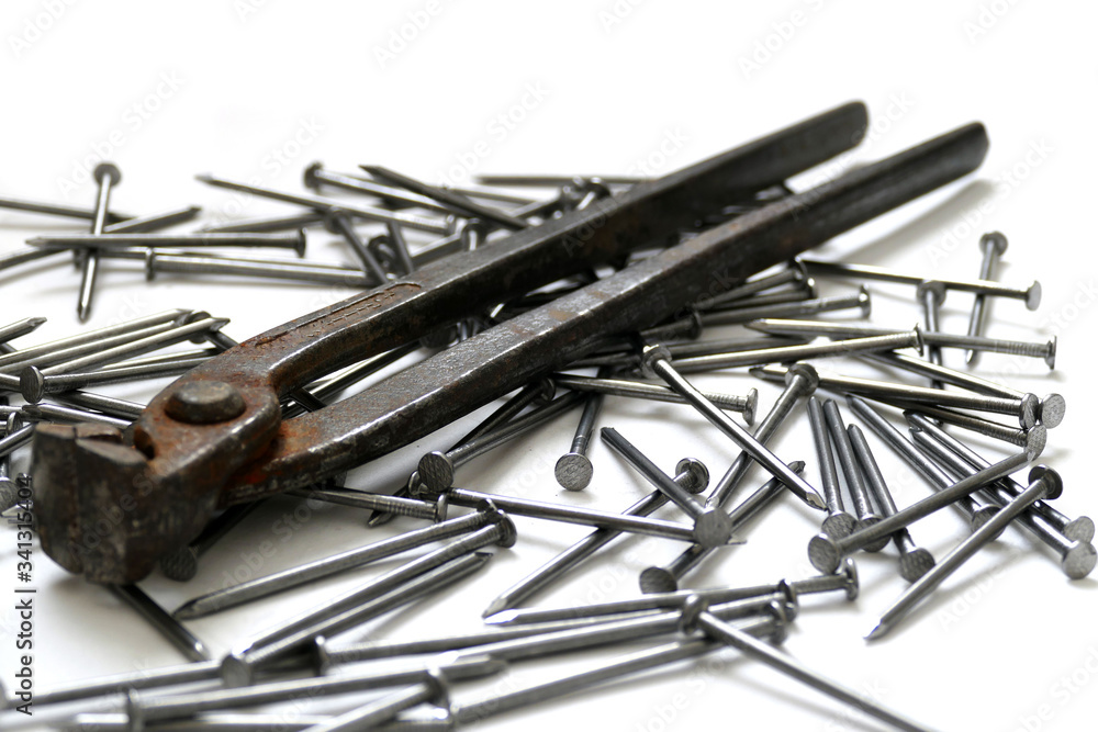 nails and nippers on a white background, nails and nippers on a white background,