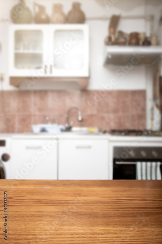 Blurred kitchen interior with desk space