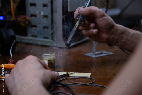 blowtorch, male hands, equipment repair at home