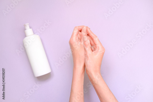 Washing hands using soap foam. Hand hygiene. A woman washes his hands with soap, antibacterial protection