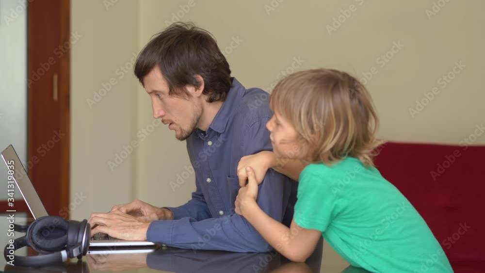 During quarantine man is trying to work remotely from home, but his son disturbes him. Children and parents conflicts during self-isolation During quarantine man is trying to work remotely from home, but his son disturbes him. Children and parents conflicts during self-isolation