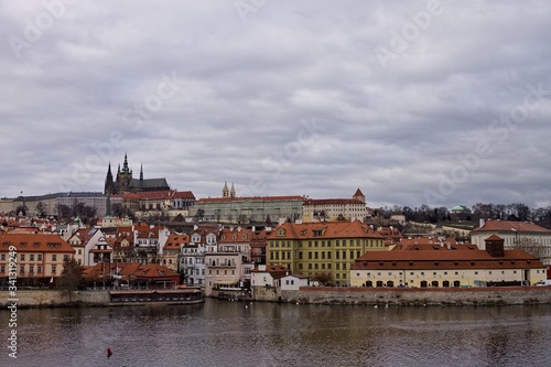 Panoramic view of Mala Strana quarter with the castle, from the Charles Bridge on the Vltava river (Prague, Czech Republic, Europe)