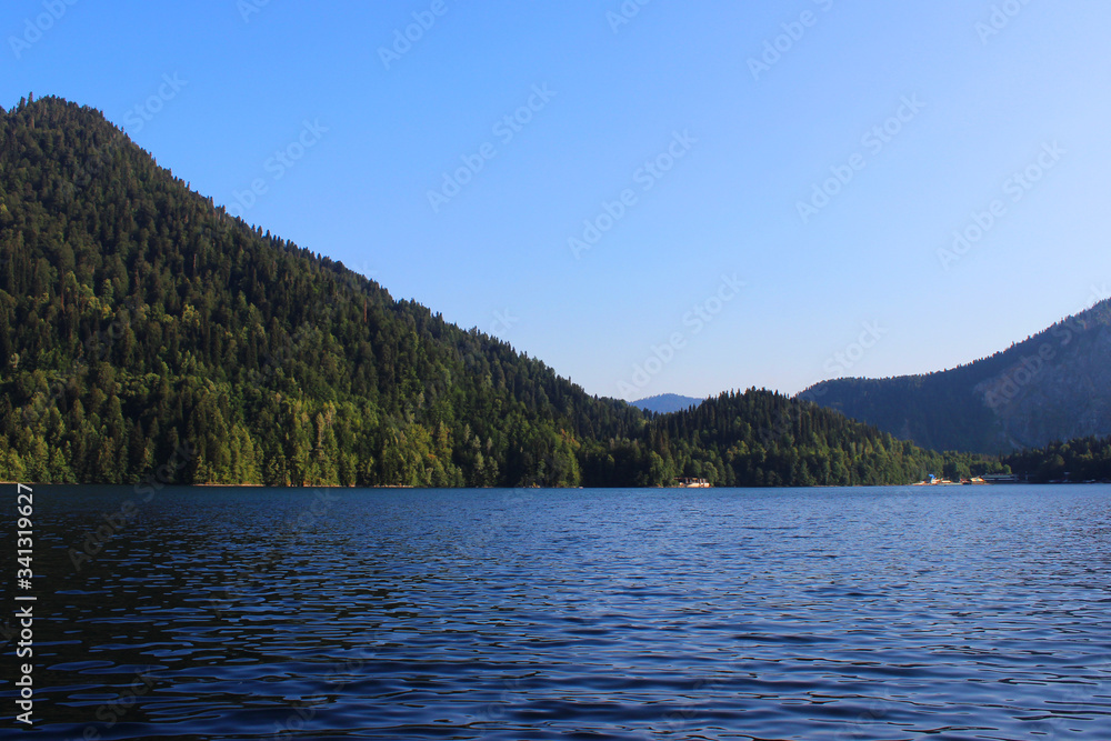 Forest lake calm in the Caucasus mountains Forest lake calm in the Caucasus mountains