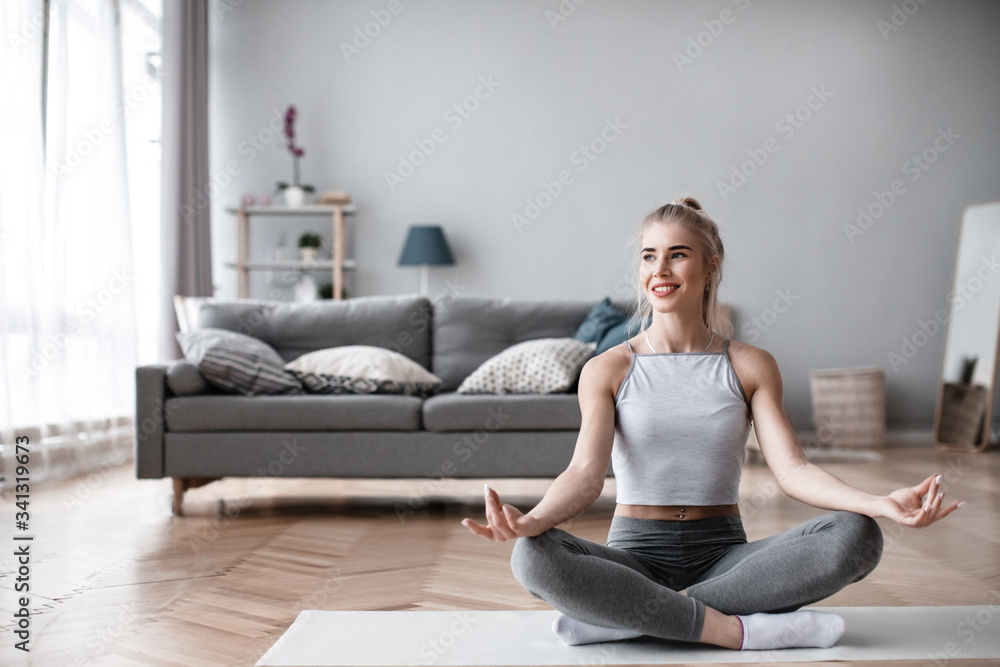 Fit young woman doing exercises at home. Fit young woman doing exercises at home.