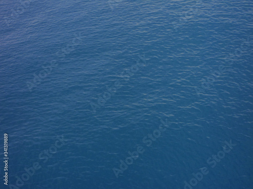 Calm blue water surface of the sea. Sea background