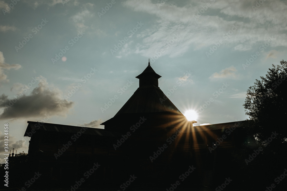 Moscow Russia - 07 26 2019: Kolomenskoye Park silhouette of a building at sunset in city park under sunny light