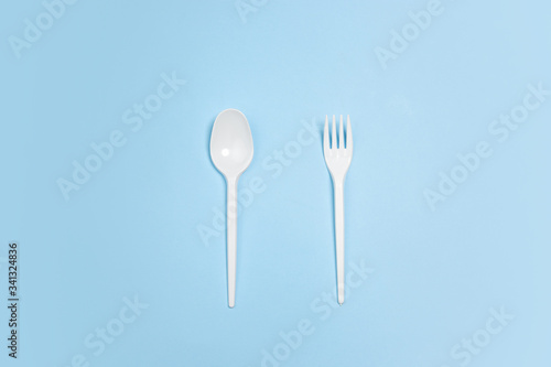 Fork and spoon. Eco-friendly life - polymers  plastics things that can be replaced by organic analogues. Home style  choose natural products for recycle and not harmful to the environment and health.