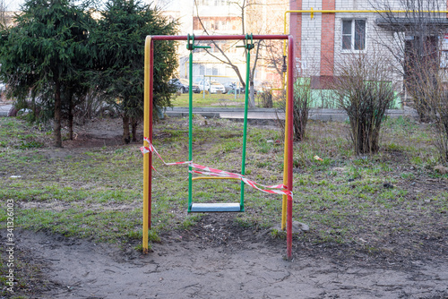 Empty playground, rocked fenced by signal tape. Quarantine. Self isolation.