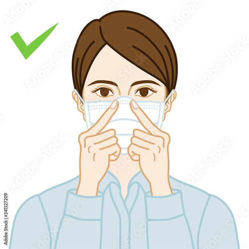 Young woman wearing a face mask correctly, fitting  in a nose line