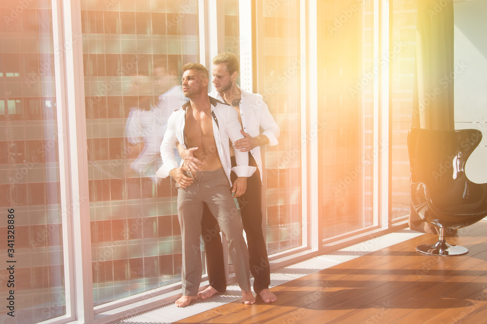 Young attractive couple is resting and working at home. Young attractive couple is resting and working at home.