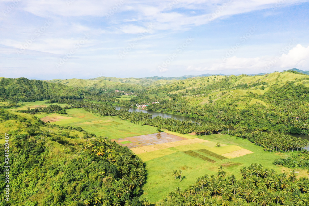 River and green hills. Beautiful natural scenery of river in southeast Asia. The nature of the Philippines, Samar