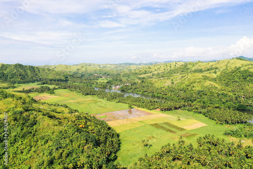 River and green hills. Beautiful natural scenery of river in southeast Asia. The nature of the Philippines, Samar